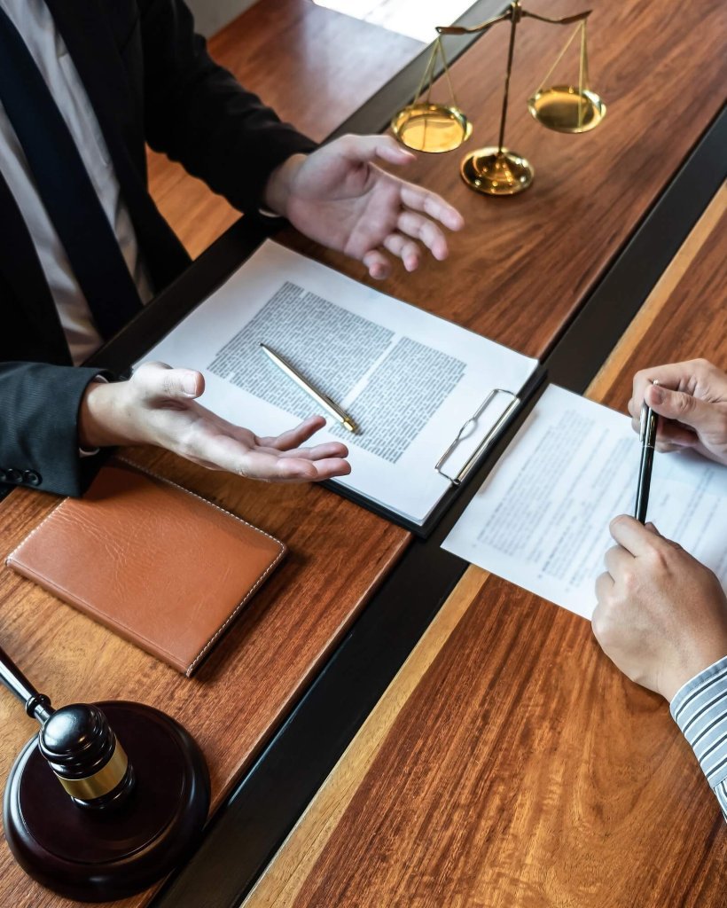 male-lawyer-discussing-negotiation-legal-case-with-client-meeting-with-document-contract-in-office.jpg male-lawyer-discussing-negotiation-legal-case-with-client-meeting-with-document-contract-in-office.jpg